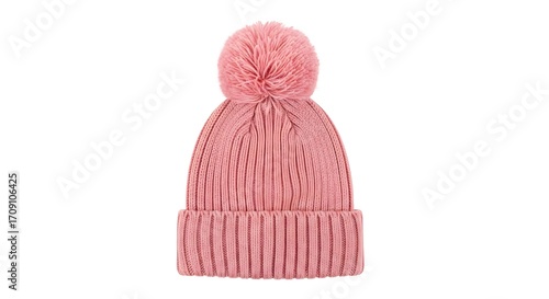 Obraz na płótnie A cozy pink knitted beanie hat with a fluffy pompom, isolated on white backgroun