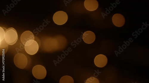 Abstract light leaks with a soft bokeh effect, gently swirling and expanding, seamlessly looping vintage, ethereal, modern