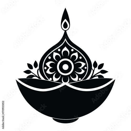 Elegant black silhouette of a traditional indian oil lamp with floral ornament for celebrations