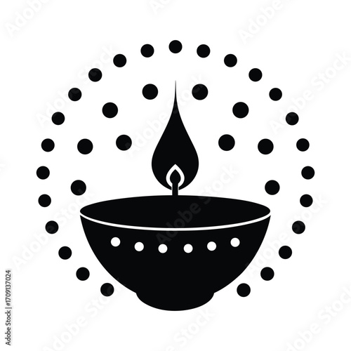 Diwali lamp silhouette of traditional oil lamp with decorative dots and flame glowing brightly
