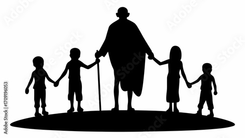 Silhouette of a man with a cane holding hands with four children on a grassy hill in black and white