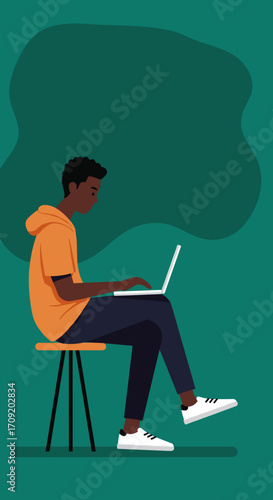 Young Black man working remotely on a laptop, comfortably seated on a bean bag chair. Ideal for freelance, online education, and modern flexible work lifestyle.