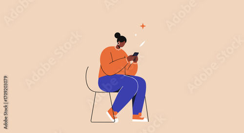 A young African American woman sits comfortably on a chair, engrossed in her smartphone, actively engaging with digital content and social media applications.
