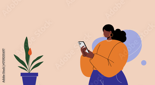 Modern person working remotely with laptop and smartphone. Concept of online business, digital communication, freelance lifestyle, or distance education.