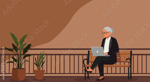 An elegant senior woman with stylish grey hair and glasses diligently works on her laptop while comfortably seated on an outdoor park bench, surrounded by potted greenery.