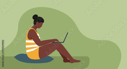 Relaxed woman in pajamas working or browsing on laptop from a comfy armchair at home. Ideal for remote work, online learning, or casual leisure.