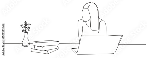 continuous line art of a woman sitting in front of a laptop looking at a pile of books and flowers.


