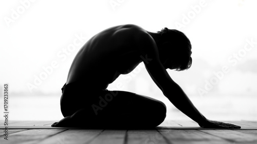Silhouette yoga pose black and white photography for wellness and flexibility training stretching exercise 100