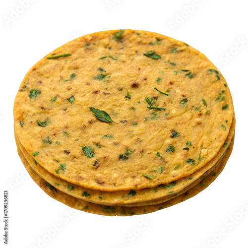 Stack of Round Yellow Indian Flatbreads with Green Herbs and Spices indian food roti