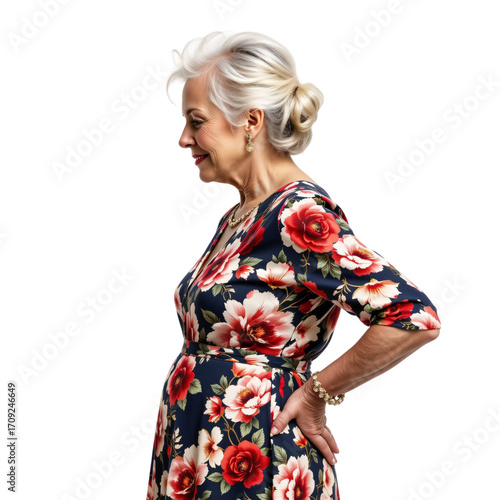 Elegant senior woman posing in floral dress studio portrait indoor environment fashion concept