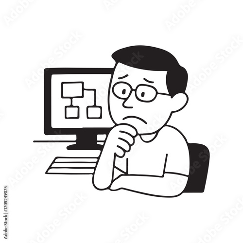 Man Concentrating on Computer Diagram.

