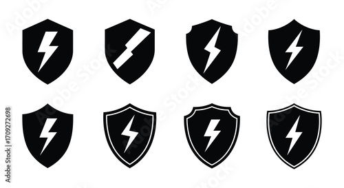 Black shields with lightning bolt emblems a set of vector illustrations
