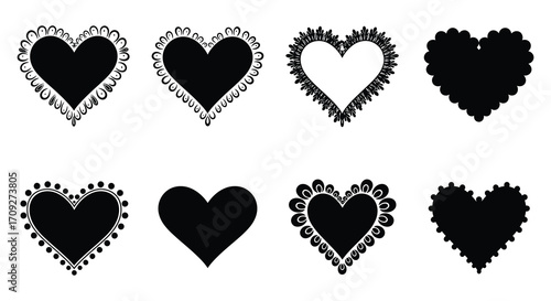 A collection of black and white ornate heart shapes in a grid layout