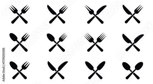 Black cutlery set including forks knives and spoons in a grid pattern
