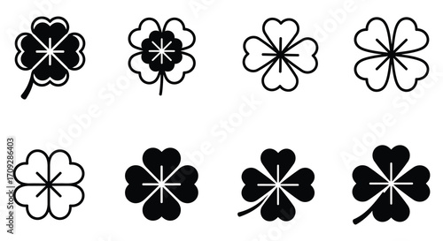 A collection of black and white clover illustrations in varying styles