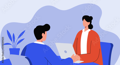 Professional man and woman engaging in a business meeting with a laptop. Ideal for concepts of collaboration, interviews, or corporate discussion in a modern office.