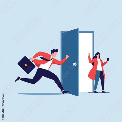 A businessman rushes through an open door while a woman stands in the doorway looking at her phone.