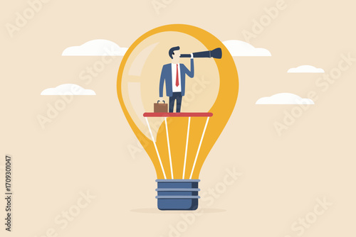 Businessman with telescope inside a light bulb looking towards the future with clouds in the background