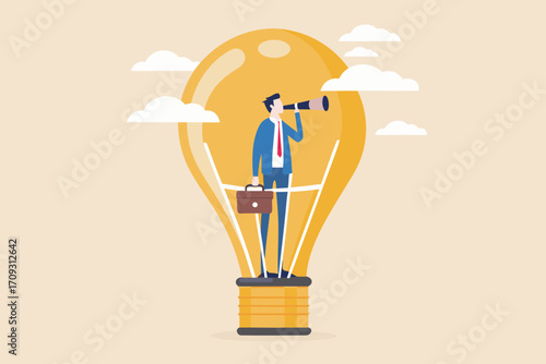 Businessman with telescope inside a light bulb looking towards the future with clouds