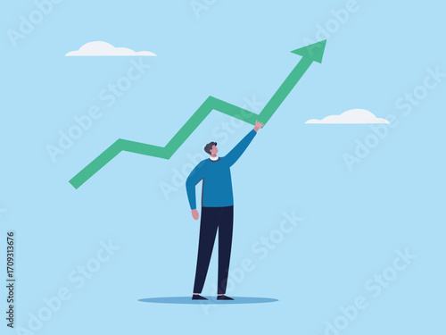 Man reaching up to touch a green upward trending graph line against a light blue sky with clouds