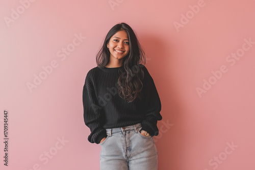 a young woman wearing a black sweater and jeans, woman, fashion, beauty.