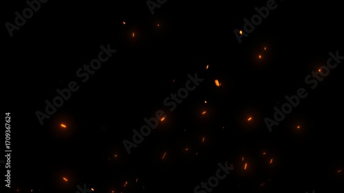 Particles flying in wind on fire background Animation. Seamless loop. Sparks on a black background. Flying bonfire ember sparks. fire flaming embers disperse on black background. Flaming embers