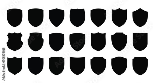 Collection of twenty-four black shield silhouettes, various shapes and sizes.