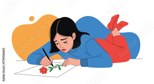 A young girl thoughtfully draws a flower while lying on the floor with abstract shapes in the background.