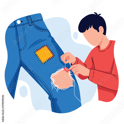 Boy sewing a patch onto ripped jeans.