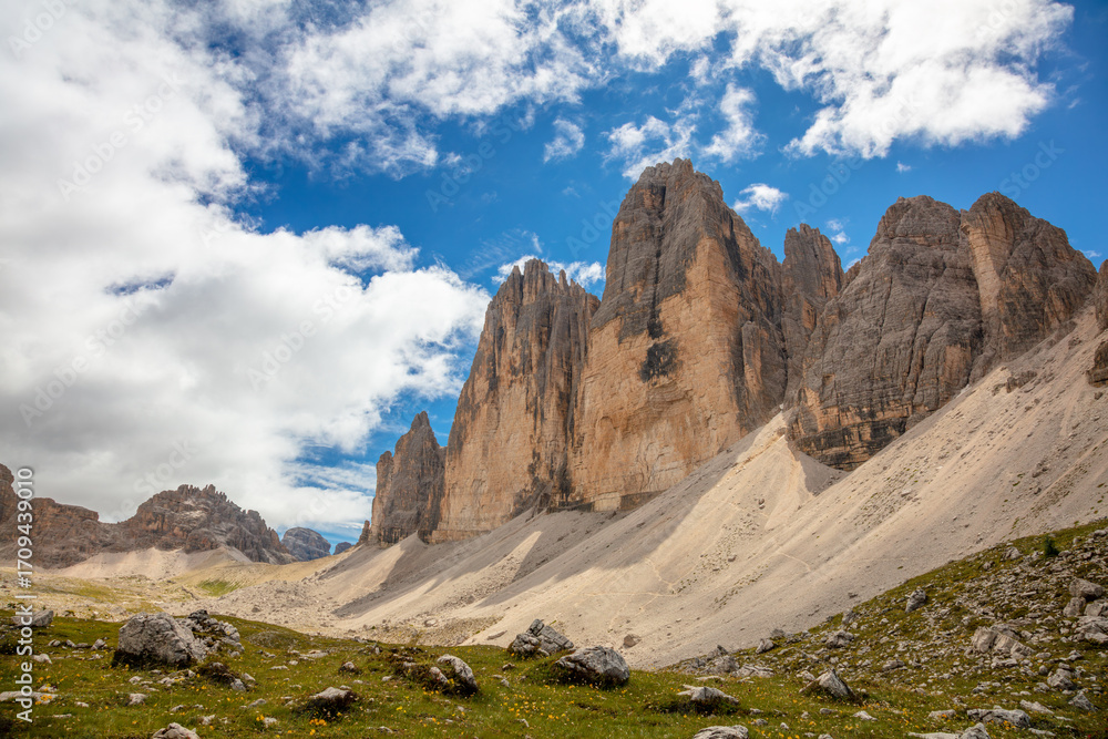 Fototapeta premium Tre Cime di Lavaredo in Sunshine and Light Clouds