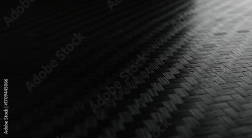 Black Carbon Fiber Texture Background Woven Pattern.