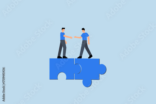Collaborate, Successful entrepreneurs complete the agreement and shake hands over a jigsaw puzzle.