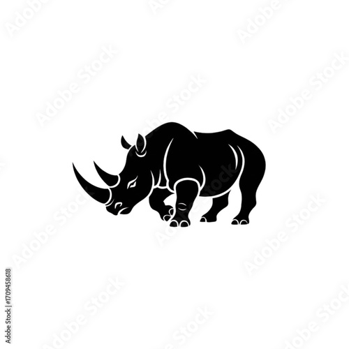 Powerful rhino silhouette emblem, strong wildlife symbol for conservation projects and logo design