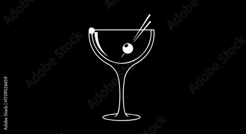 Elegant martini glass with olive and stirrer evokes sophisticated cocktail enjoyment and celebratory moments.