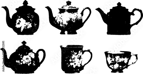 Vintage teapot and cup set in black and white. Decorative vector illustration featuring floral designs on porcelain.