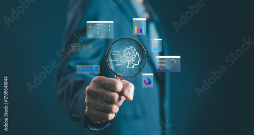 Businessman holding a magnifying glass with AI technology icons and data analytics charts, symbolizing artificial intelligence, machine learning, digital innovation, business strategy. smart ai data