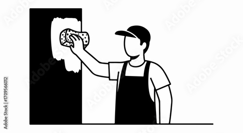 Cleaning service worker cleans wall with sponge, depicting cleaning service in action. Cleaning service professional removing dirt from the wall.