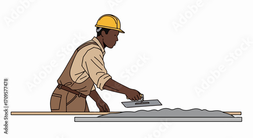 Construction worker smoothing cement with a trowel. This construction worker is working meticulously, perfecting freshly poured cement.