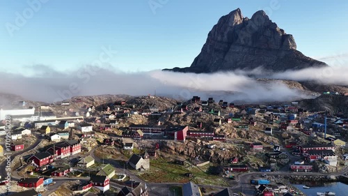 Bird's-eye view. Greenland, Uummannaq town houses, under a blanket of fog