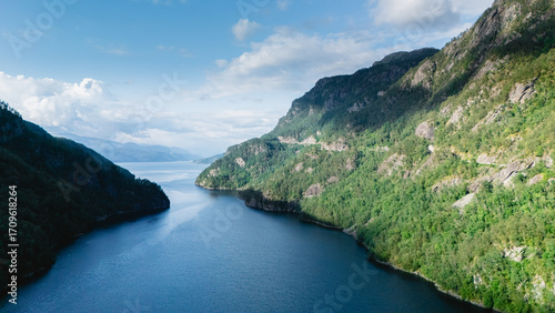 Εκτύπωση καμβά Captivating vistas of Lovrafjorden showcase serene waters flanked by steep, verdant cliffs