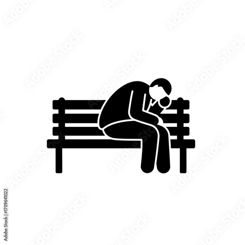 Silhouette of a lonely person slumped over on a park bench conveying sadness and isolation artistic representation