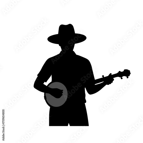 Silhouette of a musician playing banjo outdoors wearing a cowboy hat
