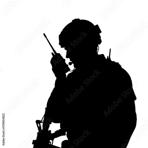 Silhouetted soldier communicating with radio gear tactical military operations action