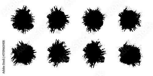 Collection of eight distinct black ink splatters with rough edges and translucent grey halos on a white background