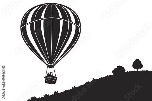 Hot air balloon silhouette on white background