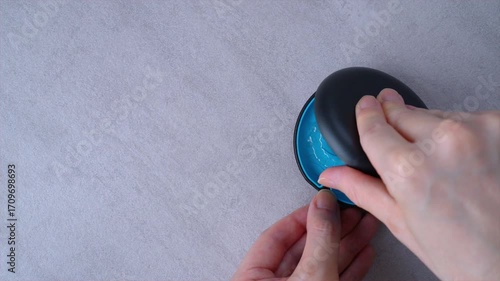 Opening blue dental aligner case that are  orthodontic mouthpiece storage in marble background.