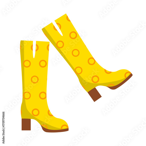 A pair of trendy high-heeled yellow boots with a vintage circle design