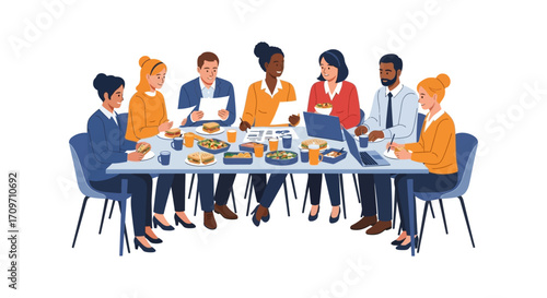 Diverse team eating lunch at meeting reviewing documents and laptop in modern office ideal for teamwork and business collaboration concepts.