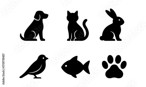 Set of black silhouettes of pets and animals: dog, cat, rabbit, bird, fish, paw print