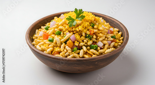 Bhel Puri Indian Street Food Snack Puffed Rice with Vegetables and Tangy Chutney in Earthen Bowl